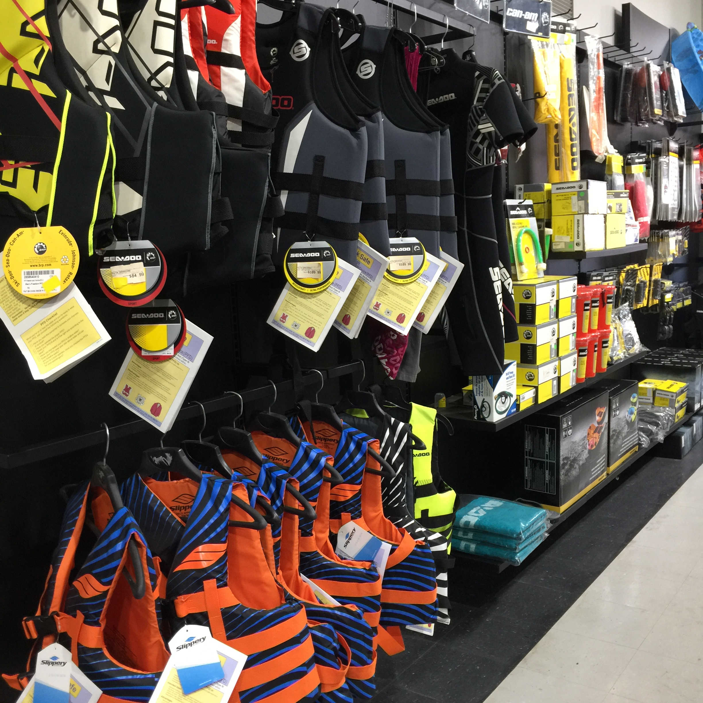 A wall of accessories at Loewer Powersports parts department